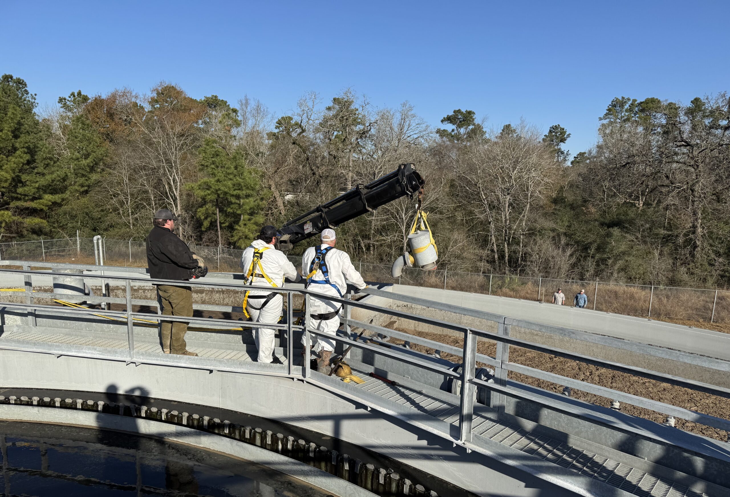 Premier Wastewater & Septic team pumping a septic system for efficient wastewater management.